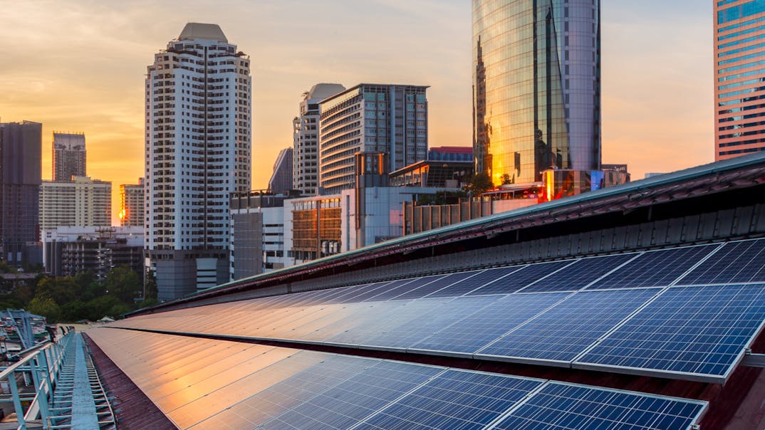 Solar photovoltaic installation on a city rooftop. Image Credit: Garn Phakathunya | Dreamstime.com.