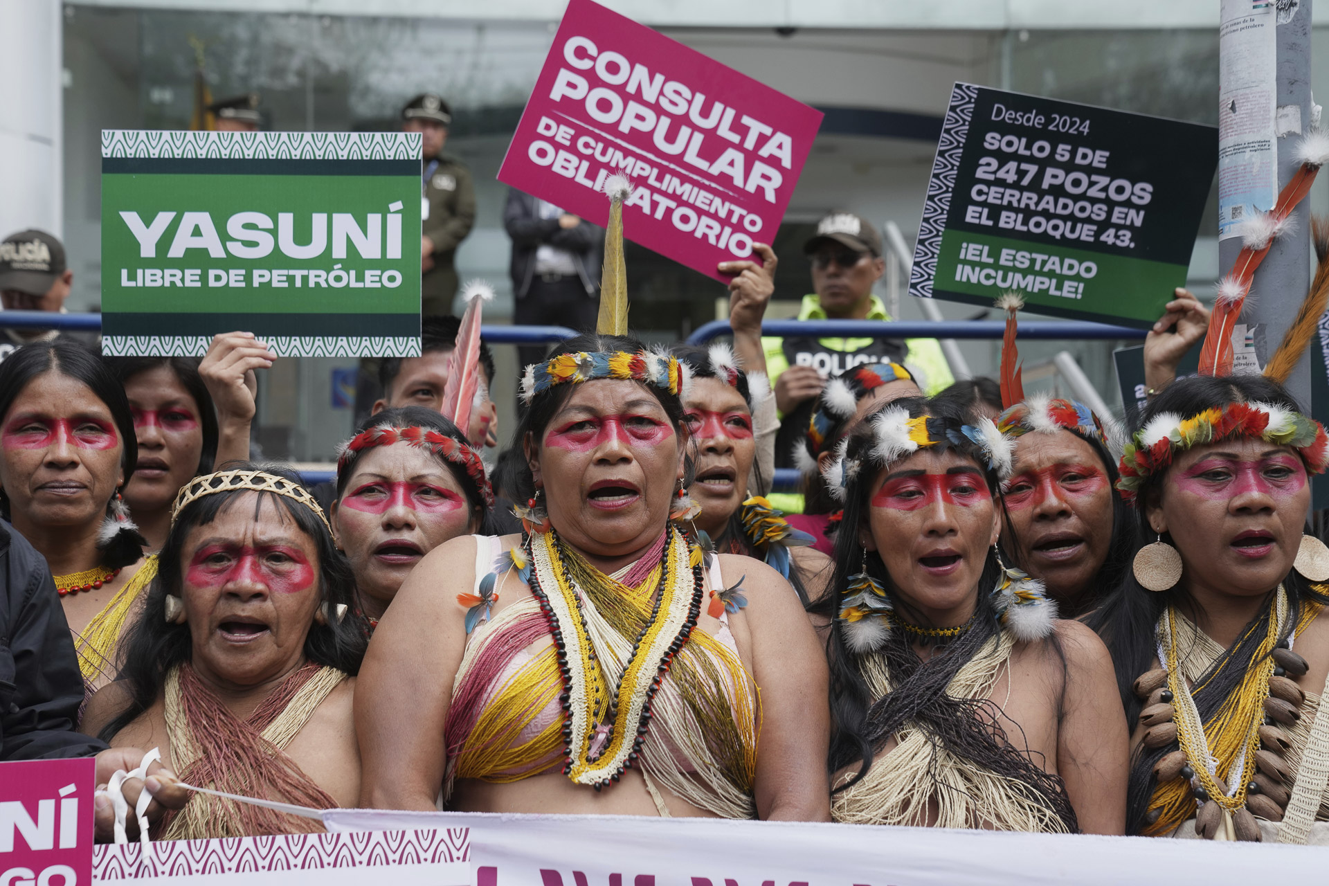 The Waorani indigenous people lead a demonstration in front of the Constitutional Court in Quito, Ecuador. Image Credit: AP Photo/Dolores Ochoa via Earth Insight.